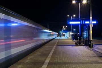 Papier Peint photo Gare Passing high- speed train Pendolino, Poland.