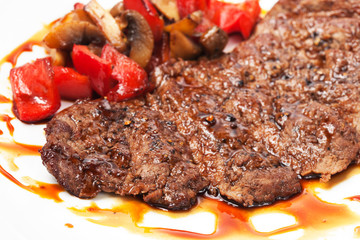 barbecue with sauce and vegetables