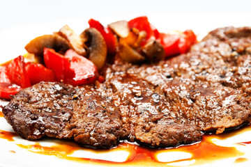 barbecue with sauce and vegetables