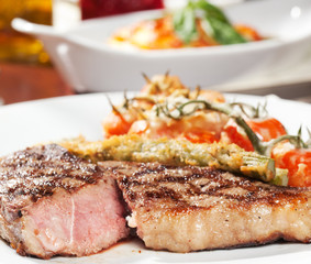 barbecue with sauce and vegetables