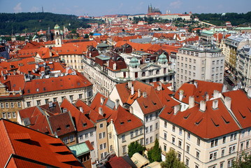 Fototapeta na wymiar Red roofs of houses in Old Central Square, Prague