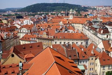 Obraz premium Red roofs of houses in Old Central Square, Prague