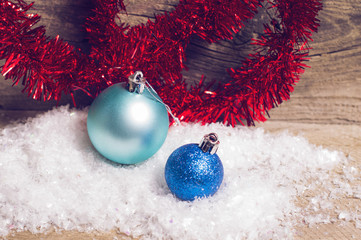 Blue christmas baubles red tinsel