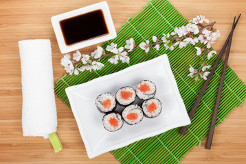 Sushi maki set and sakura branch