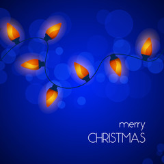 Christmas lights on blue background