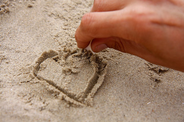 Hand drawing a heart