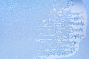 Winter background, frost on window
