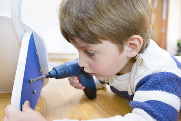 Little Boy using diy tool