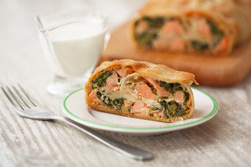piece savory strudel with fish and spinach