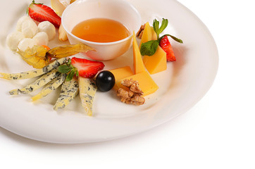 Assorted cheese with honey