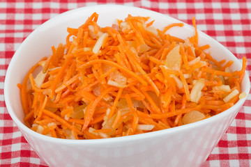 grated carrot with pineapple on the tablecloth