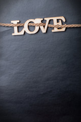 carved wooden letters love