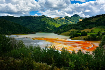 red  polluted lake  in Romania, Geamana