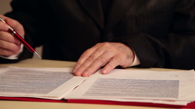 businessman working with documents, close-up of hands 2