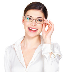 Portrait of the beautiful happy  woman in glasses