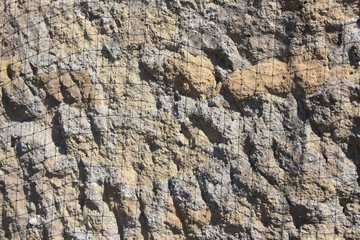 Parete di tufo come sfondo