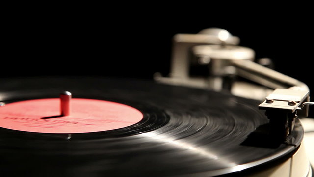 gramophone record on a black background, close-up