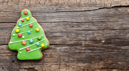 Christmas homemade gingerbread cookies on wooden table