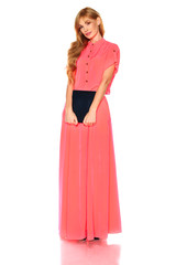 Girl in pink dress with tablet computer