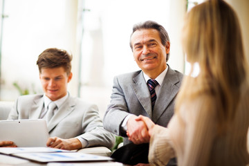 Business people shaking hands