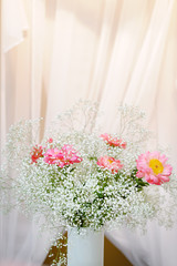 Bright flowers bouquet in vase