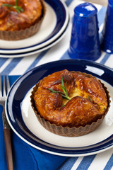 Spinach Artichoke Baked Egg Souffle. Selective focus.