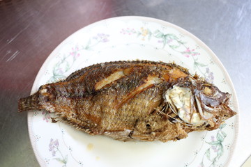Fried fish on a dish.