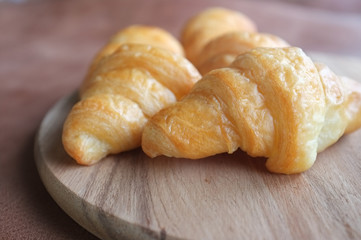 Croissants on wood and  leather background