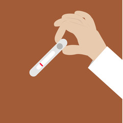 hand with pregnancy tests