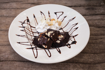 Chocolate brownie with nuts.