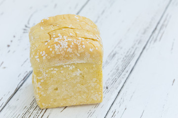 moldy bread on white table wood