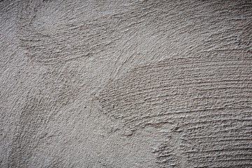 plasterer concrete on wall of house construction