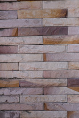 Old stone wall with a pattern.