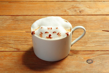 close up hot latte on wooden table