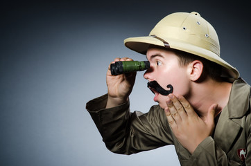 Man in safari hat in hunting concept