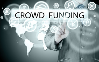 Businessman pushes virtual crowd funding button