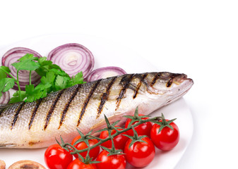 Grilled fish with vegetables.
