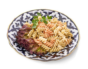 Penne pasta with sauce, cheese and basil, selective focus