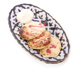 Mini cheesecake with fresh raspberries