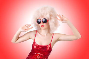 Cute woman in afro wig