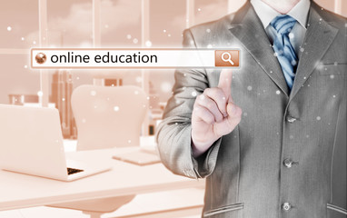 Online education written in search bar on virtual screen.