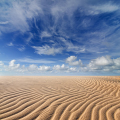 Fototapeta na wymiar sand desert and blue sky