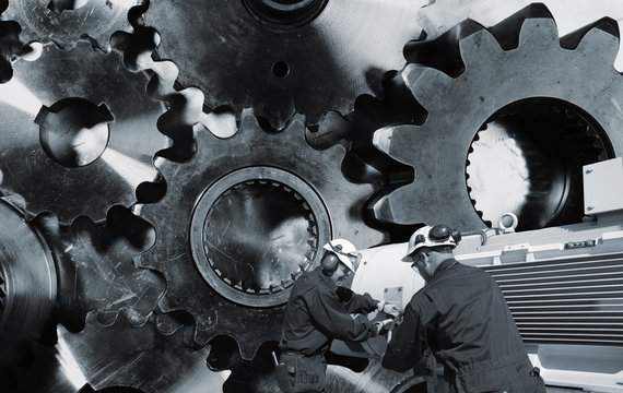 mechanic, workers with giant cogwheel machinery