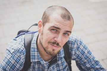 handsome hipster casual multitasking modern man with vintage cam