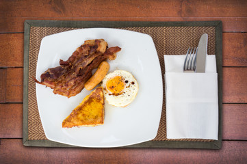 American breakfast on wooden table