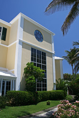 An office building in a tropical country, against a blue sky
