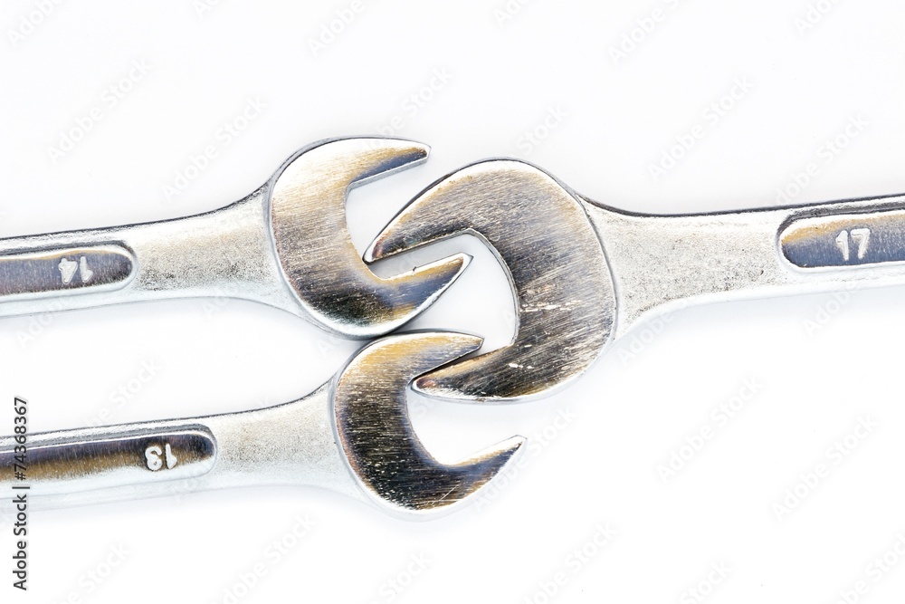 Wall mural Wrench tools chain on white background isolated