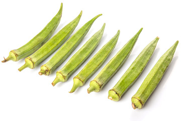 Okra or ladies' fingers vegetables over white background