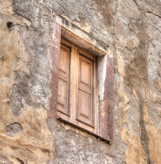 wooden window in an old wall
