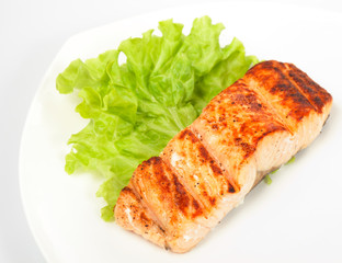 grilled salmon on white plate